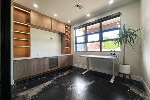 Beautiful Entertainment Center with Lighting and Metal Door Fronts