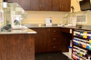 Commercial Space - Warm Wood Cabinetry for Pharmacy