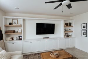 White Entertainment Center with Wood Shelving