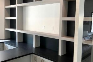 Home Office - Gray built in wall unit with desk and shelves