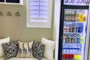 Mudroom and Seating - White built in bench under window with drawers