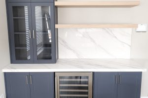 Mysterious Blue Bar with Floating Shelves, Quartz and Glass