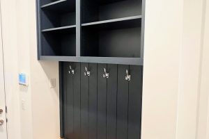 Mysterious Blue Mudroom with Vertical Shiplap