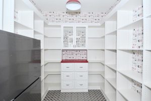 Pantry & Bar - White, red, and black custom pantry with wallpaper