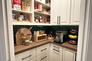 White Pantry with Wood Toned Countertop 1